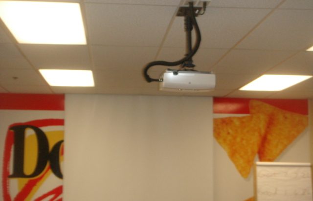 Ceiling projector and pull-down screen in an office, installed by Dave's Home Theater